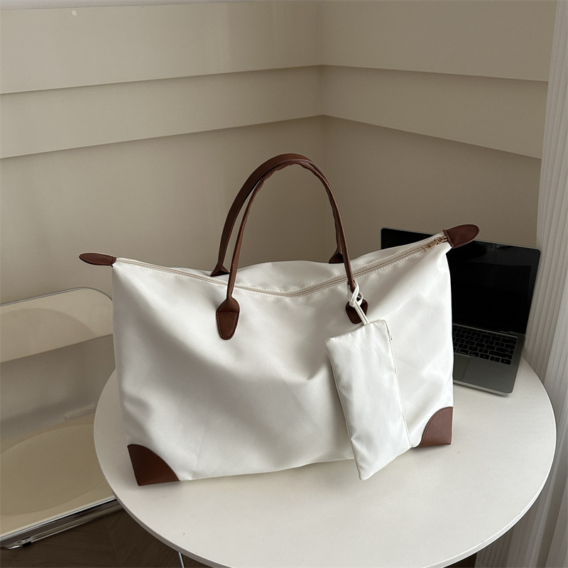 Bolsa de viaje para mujeres 2024 nueva sensación de alto nivel bolsas de bolsas de viajes portátiles bolsas de bolsas de moda de hombro de gran capacidad para mamá