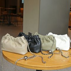 トップ層牛革小衆百合女性バッグシングル肩斜めショルダーシンプルバッグ磁気ボタン餃子バッグチェーン金球小香風