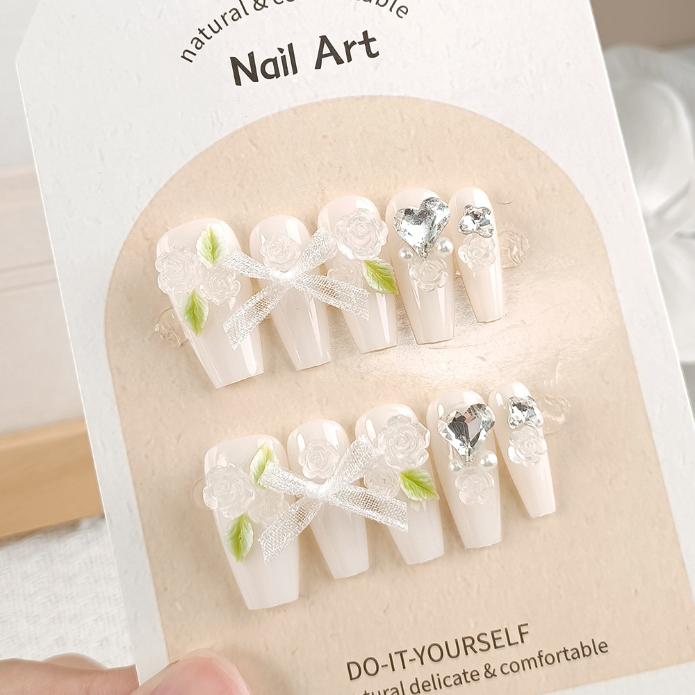 Manicura de Año Nuevo, 10 piezas de diamantes de perlas hechos a mano, arte de uñas portátil, parche de uñas Xiaohongshu, venta al por mayor