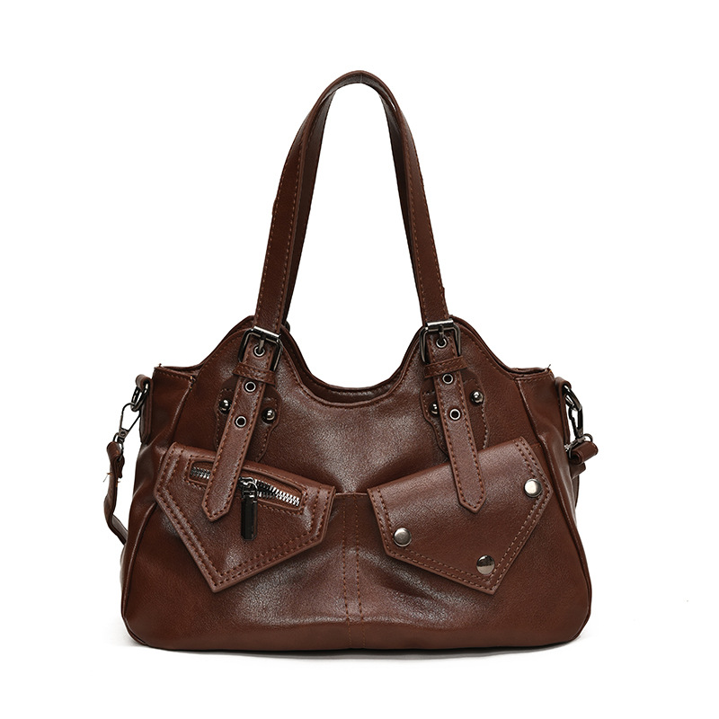 2024 transfronterizo retro Europa y América de gran capacidad bolso de hombro nuevo bolso de mochila empalmado bolso de mujer simple bolso de remaches bolso de mujer