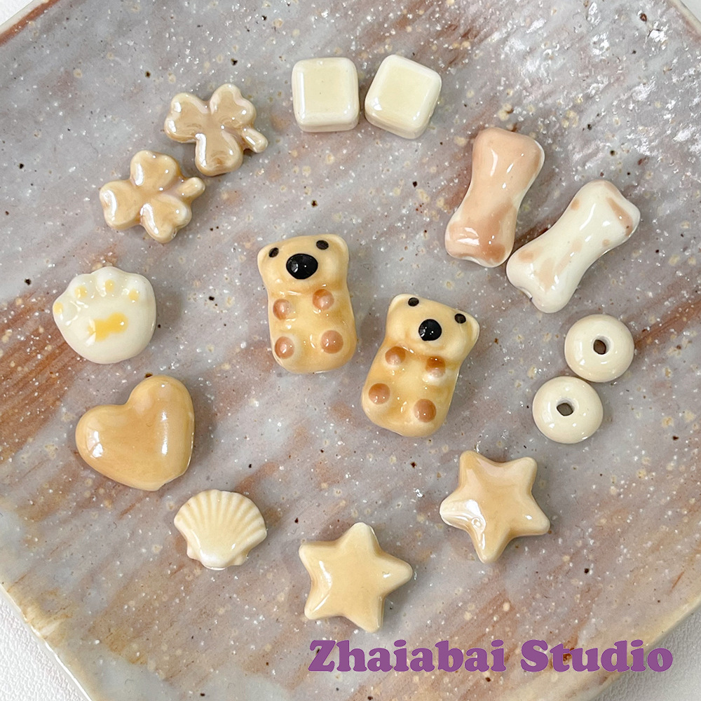 【拿铁小熊】星星爱心狗骨头猫爪陶瓷珠子diy手工串珠手链材料
