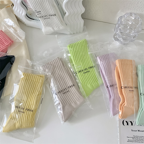 Spring and summer new style candy-colored small fresh solid color loose ruffled casual women's mid-calf socks individually packaged