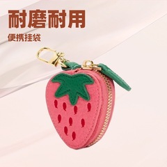 越境してよく売れている新鮮なイチゴの形の果物の小銭の包みの携帯のミニの包みは韓国系のシンプルさを掛けられます。