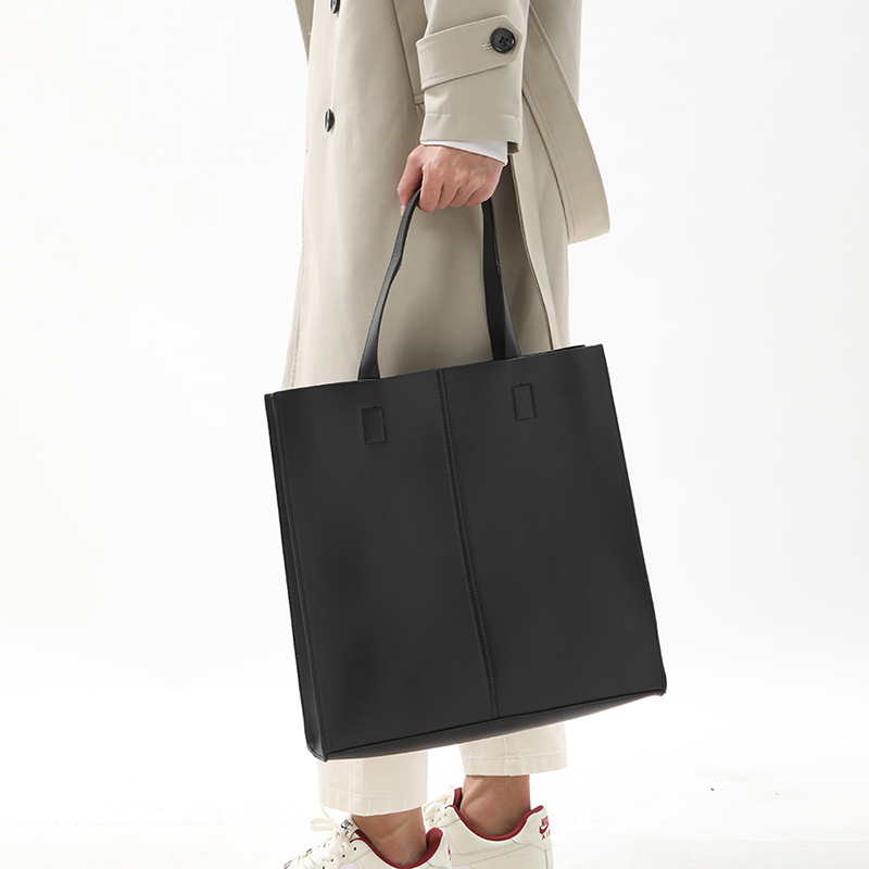 Korean version of fashionable PU leather shoulder bag, simple commuter men's and women's tote bag, square vertical crossbody large-capacity handbag_voghion.com