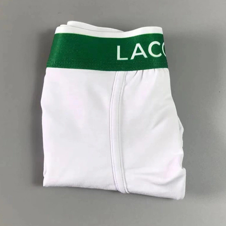 Europa y los Estados Unidos transfronterizos peces de moda para hombres, pantalones de algodón transpirables, pantalones cortos de ángulo plano de moda cómodos y casuales, productos en stock