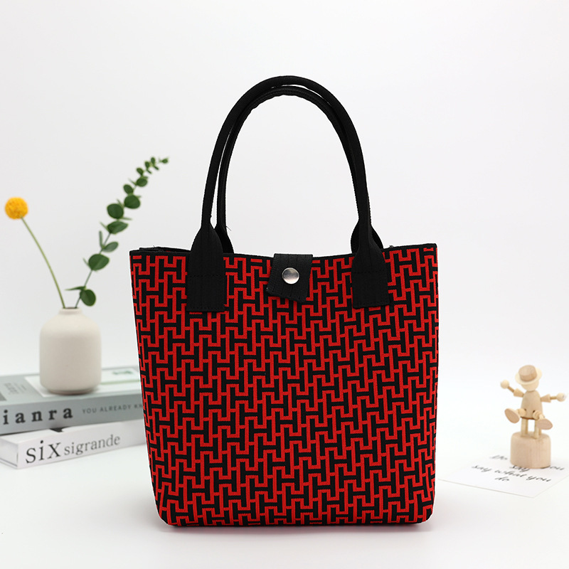 Japón y Corea del Sur tejido bolsas de mano bolsas de viaje de gran capacidad bolsas de compras de chicas fabricantes de bolsas H al por mayor
