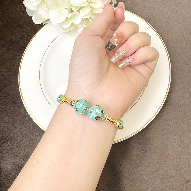 Brazalete de oro de arena de 18 quilates de Vietnam, estilo europeo y americano, brazalete de ojos del diablo, joyería de lujo transfronteriza al por mayor.