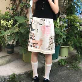 夏新款涂鸦蕾丝花边温柔甜美印花半身裙气质收腰显字短裙