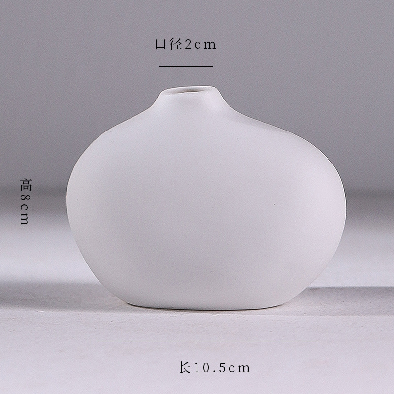 シンプルな現代の満天星陶磁器の花瓶の置物の客間の白い磁器の小さい清新な乾いた花の生け花の創意の陶磁器の花器|undefined