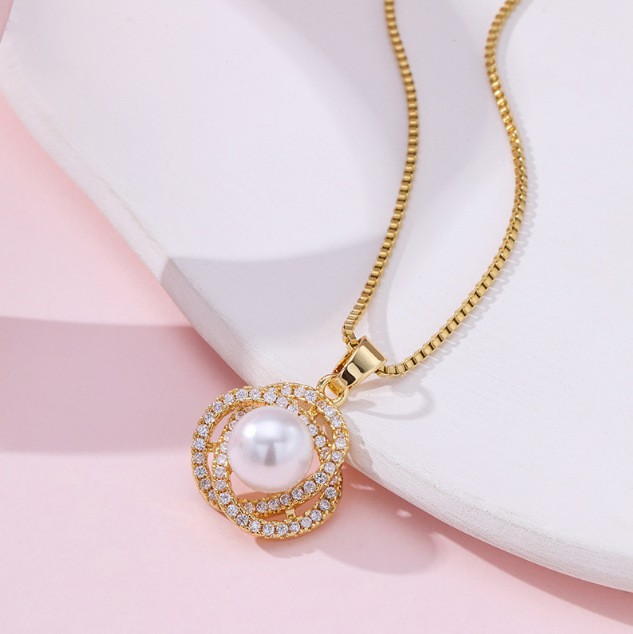 Planetenketting van titaniumstaal met parelhanger voor dames_voghion.com