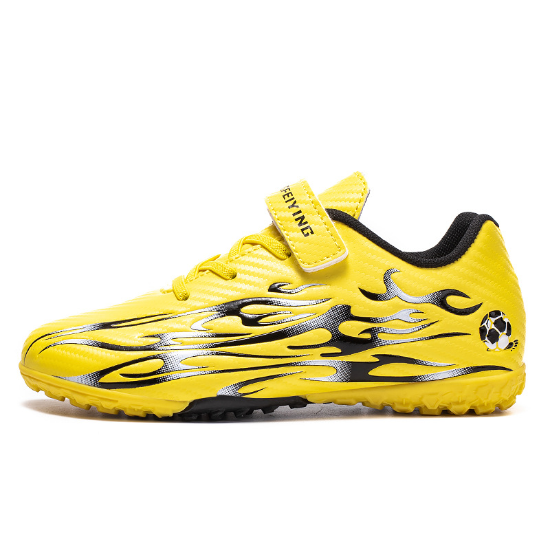 2025 nuevos niños y niñas transfronterizos zapatos de entrenamiento de clavos zapatos de fútbol estudiantes zapatos de fútbol de desgaste fábrica directa