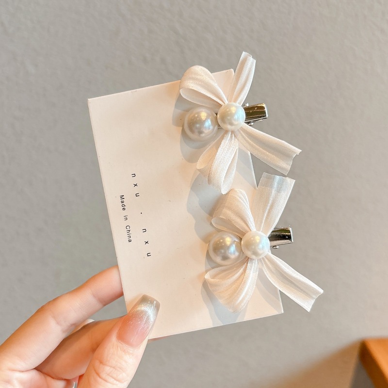 Coreana lateral frange clip de cabello de la frente de mujer sensación avanzada 2025 nuevo toque de dopamina clip de boca de pato