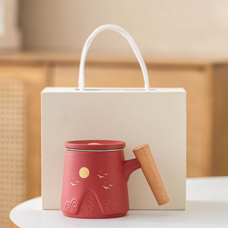 Guofeng Wenchuang marca taza de cerámica Zhoushan tres piezas juego de regalo de mano taza de calentamiento tallado comercial LOGO nombre