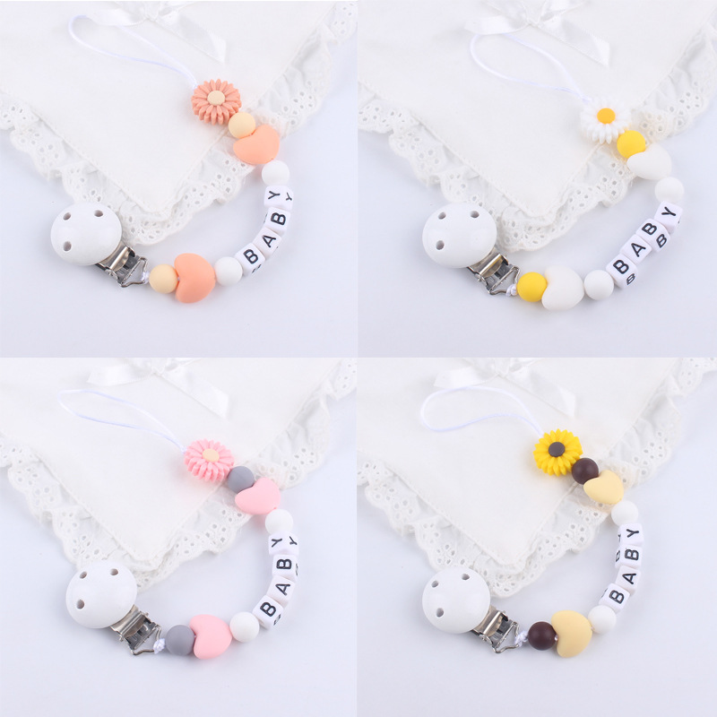Nuevo bebé suministros chupete cadena creativa bebé dibujos animados Margarita silicona mordedor mordedura-prueba cadena