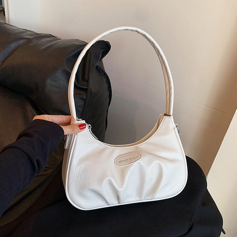 Sacos de nicho de alta qualidade para mulheres 2024 novo versátil ombro crossbody saco elegante plissado axila crescente saco_voghion.com