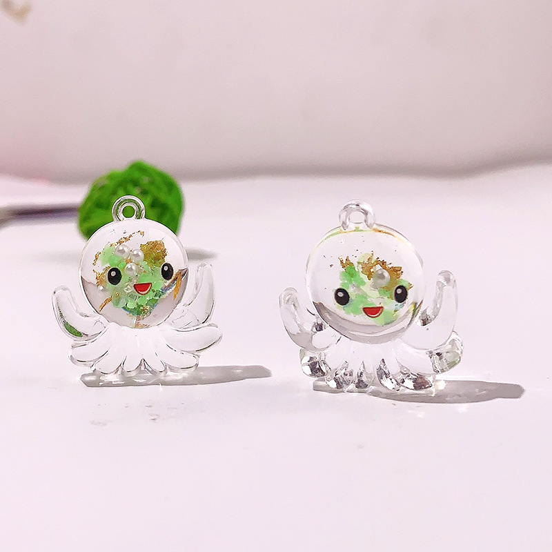 Nuevos accesorios de pulpo nocturno marino serie de cristal octopus llavero colgante DIY material pendiente