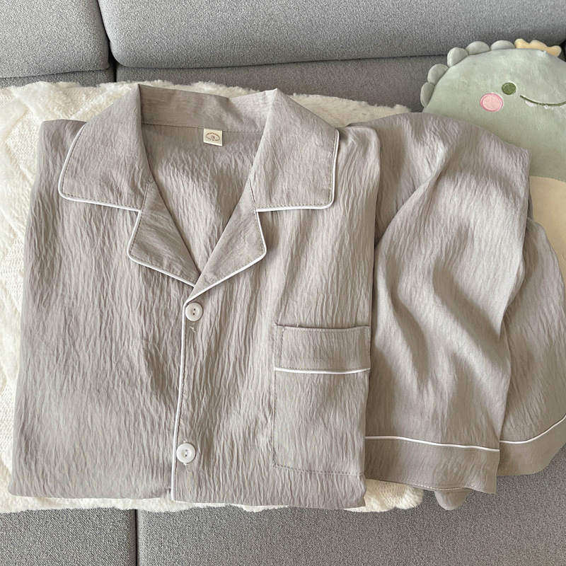 Primavera y otoño nuevos pijamas de algodón de nube de hombre delgados simples de color sólido de ocio engordado y ropa de hogar grande al por mayor