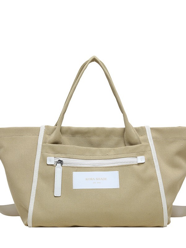 Bolso de lona de gran capacidad para mujeres 2026 nuevo tipo de mochila de hombro simple y casual para la clase de la bolsa de viaje