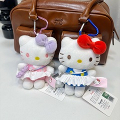 本物の KT ハローキティ ハローキティ スカートよだれかけキーホルダーぬいぐるみバックパックバッグペンダント