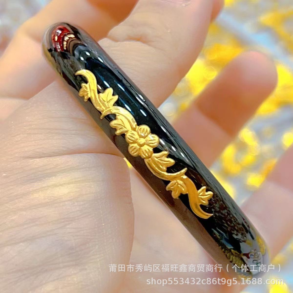 Black jade inlaid with gold