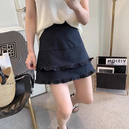 Retro black fungus edge short skirt for women, high-waisted splicing design, semi-slip A-line skirt with pleated lotus leaf edge, stylish casual attire.