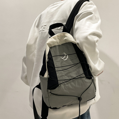 New Japanese niche color matching backpack for women 2024 new sports travel backpack middle and high school student school bag trend