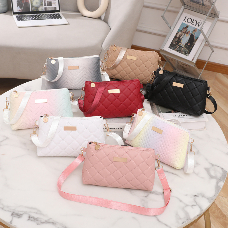 Bolso de mujer al por mayor 2025 nuevo bolso de mochila de mujer simple bolso de hombro bordado mini bolsa