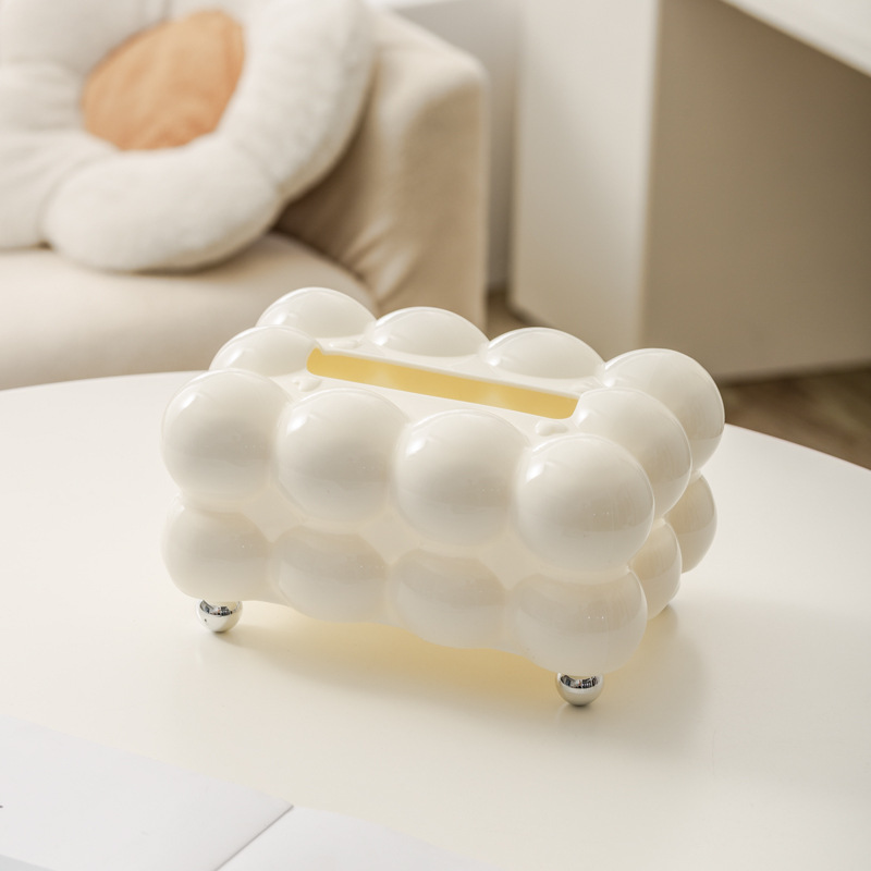 高級感のある収納ケースの新型の軽贅沢家庭用創意トイレティッシュボックスのリビングのテーブルの上に紙ナプキンを引き出します。