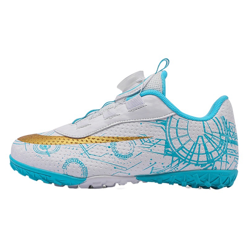 2023 hebilla giratoria transpirable para niños zapatos de fútbol de uñas rotas zapatos de entrenamiento de hierba de interior Pato Mandarín zapatillas de fútbol resistentes al desgaste