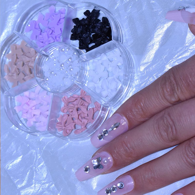 Venta caliente transfronteriza cinta de arco de uñas perla diamante Aurora oso 7 rejilla tocadiscos joyería de uñas al por mayor