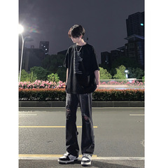 黒い穴が開いているジーパンの男性のタイプのアメリカ式の高い街のvibeのズボンのファッションのブランドの秋の薄い種類の街頭のまっすぐな筒の小さいズボン