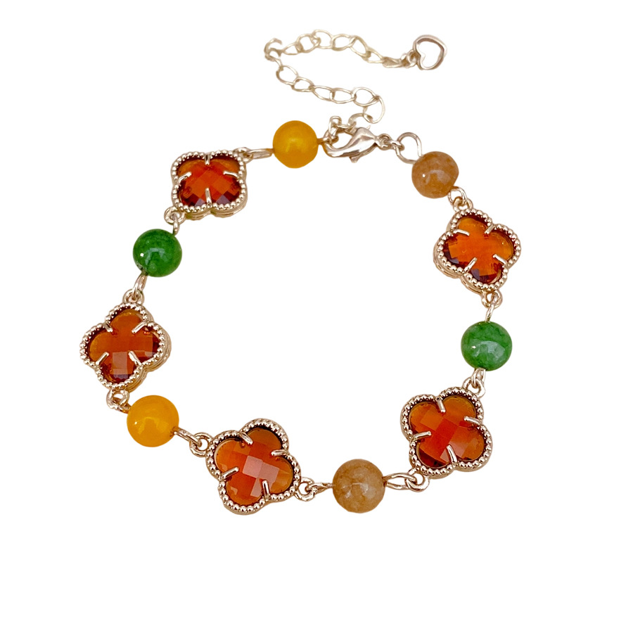 Brazalete de piedra de vidrio de hierba de la suerte ligera de lujo nicho de alta sensación pulsera fresca dulce accesorios de vacaciones joyas de mano