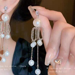 甘媚大さんの真珠のフリンジのイヤリングの女性のフリンジのイヤリングは軽くて豪華な大衆のデザイン感の高級な長いイヤリングです。