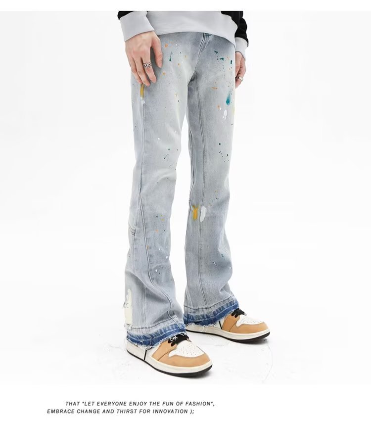 Jeans uomo slim fit stretch con strappi e taglio micro flare_voghion.com