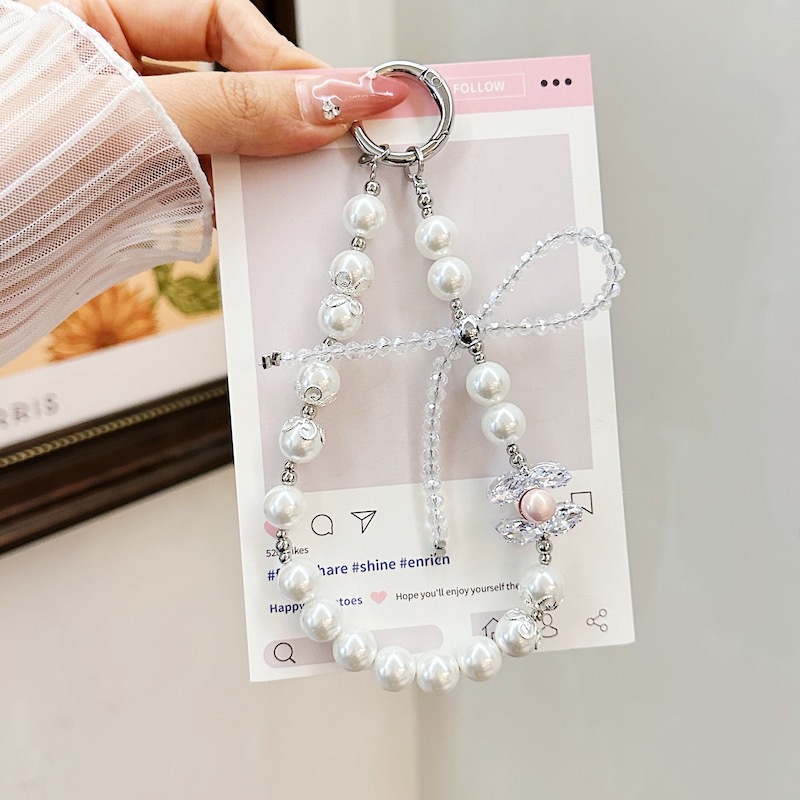 Boutique hecho a mano de alta gama cadena de teléfono móvil cadena de pulsera de perlas de tres colores cordón de teléfono móvil de moda colgante de mensajero largo