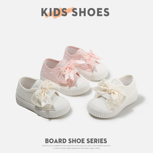 Spring and autumn children's canvas shoes with soft soles and soft surfaces, girls 'skate shoes, bow, pearl velcro, baby fashion