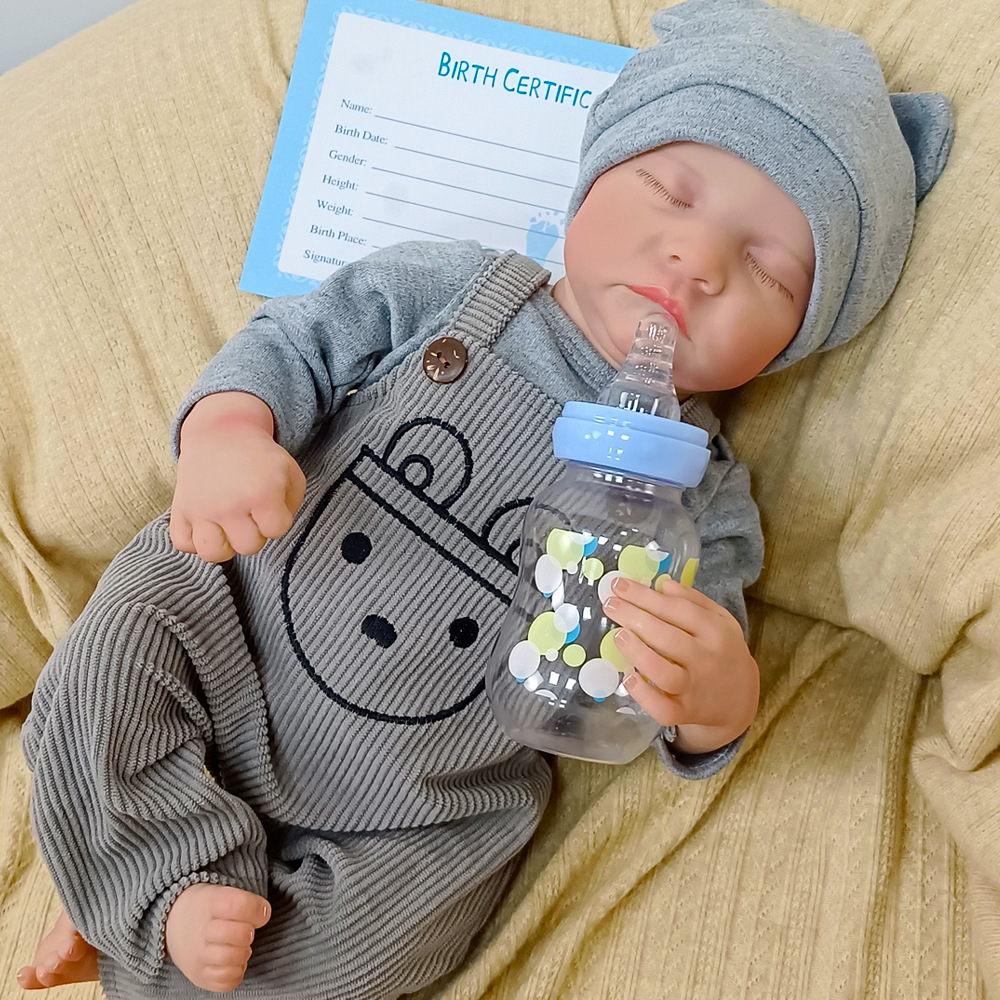 Muñeca de goma suave para bebés generación de inventario pesado pintado 18 pura muñeca hecha a mano de una pulgada de cuerpo cerrado ojos