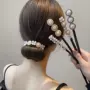盘发法式淑女珍珠丸子头