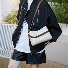 撞色頭層牛皮水桶包女2023新款單肩斜挎包通勤百搭大容量手提包