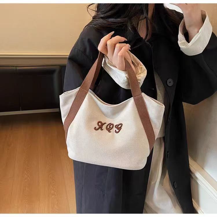 2025 New Japanese Fashion Canvas Bag Letter Print Handbag Casual Bucket Bag Class Commuting Tote Bag