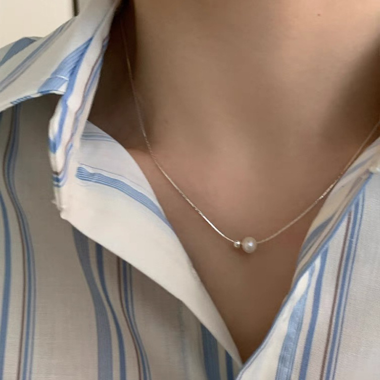 Organic geometric necklace from pearl