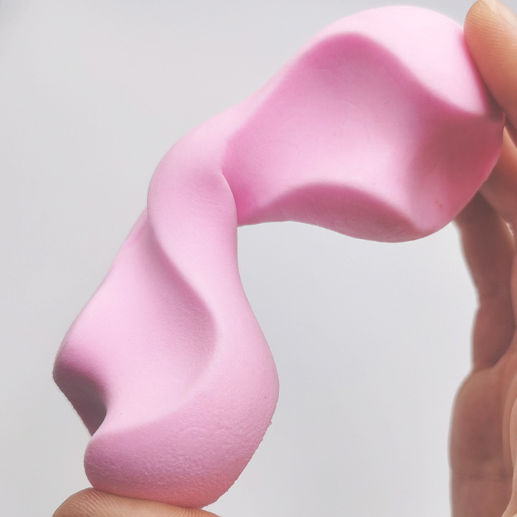 Nuevo macaron TPR espuma leche sabor hueso perro juguete nudo dientes moler palo juguete para mascotas color caramelo