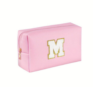 Amazon Venta caliente bolsa de cosméticos simple Pu Cruz patrón impermeable carta inicial bordado bolsa de cosméticos bolsa de almacenamiento de cosméticos