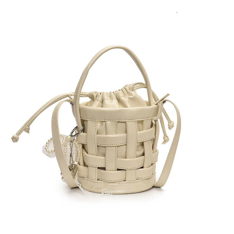 Bolso de mano tejido de nicho para mujer 2025 nuevo bolso de mensajero de moda simple y versátil bolso de verano bolso de cubo