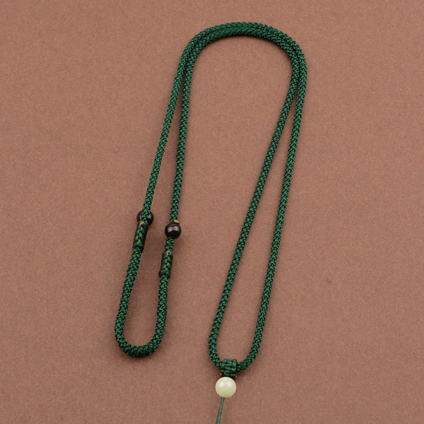 Dark green/jade top beads/left and left adjustment style