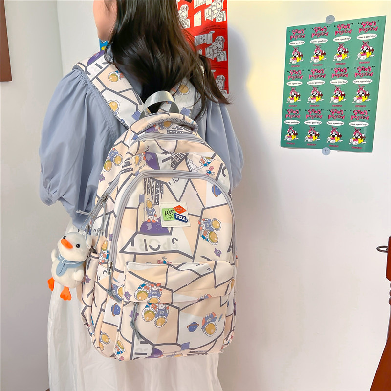 New Cartoon Splicing Graffiti Large-Capacity Backpack Women's Junior High School Student School Bag Large-Capacity Casual Backpack
