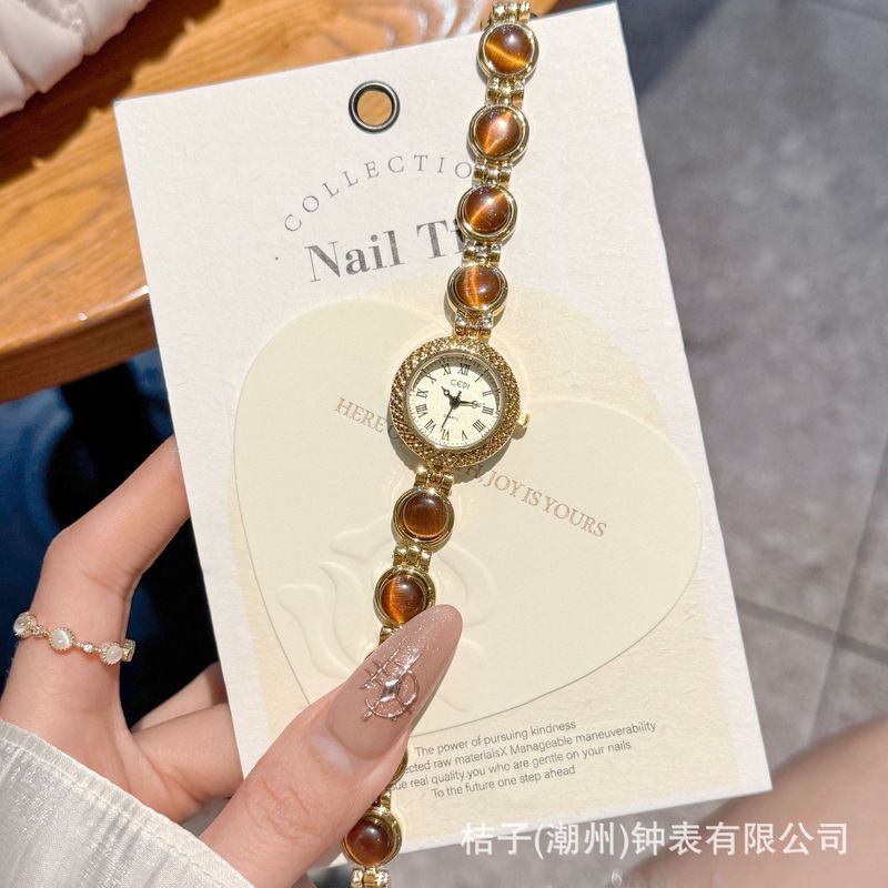 Goldie 中古ライト高級ハイエンドカラフルなブレスレットウォッチニッチハイエンドキャッツアイチェーンクォーツ時計|undefined