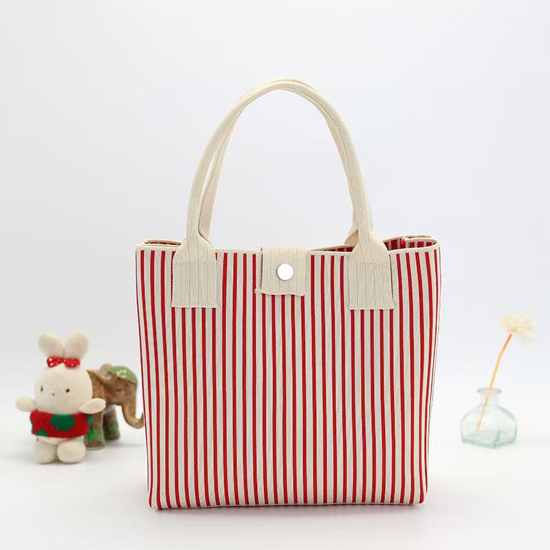Japón y Corea del Sur tejido bolsas de mano bolsas de viaje de gran capacidad bolsas de compras de chicas fabricantes de bolsas H al por mayor