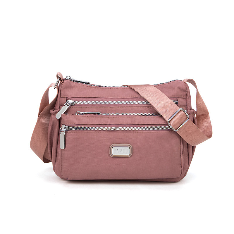 Bolso bandolera de tela Oxford para mujer 20247 nuevo bolso de mujer de mediana edad, bolso de madre de nylon de viaje de gran capacidad, todo fósforo