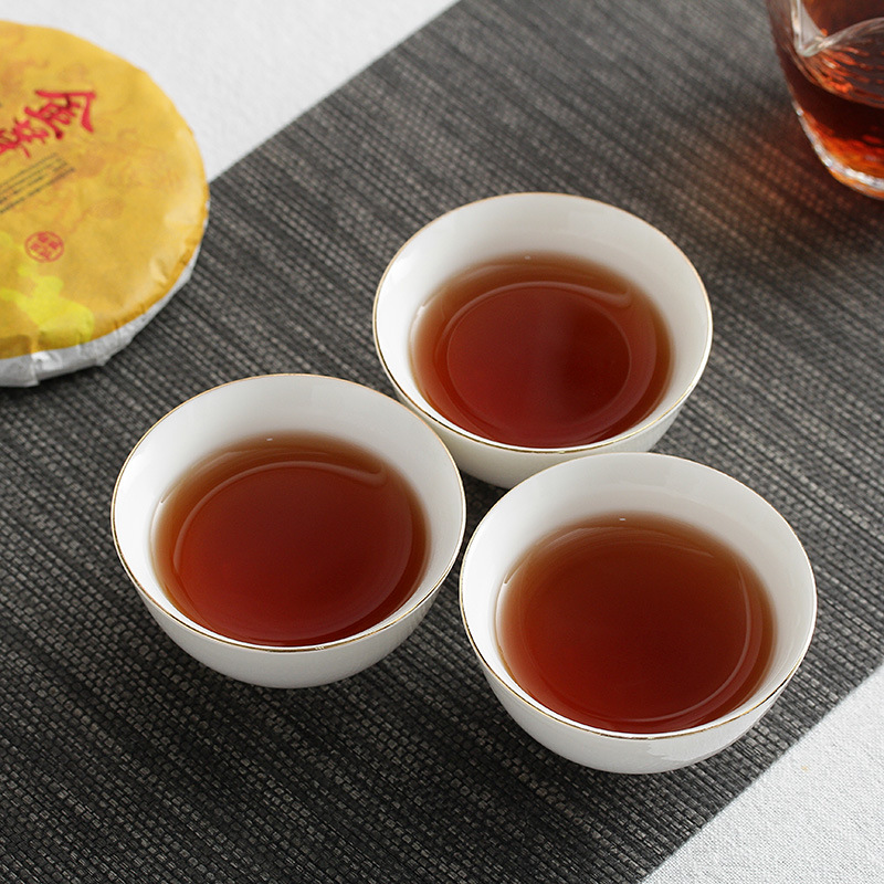 批发云南普洱茶熟茶 饼茶2009年金芽宫廷 古树 陈年普洱茶100g